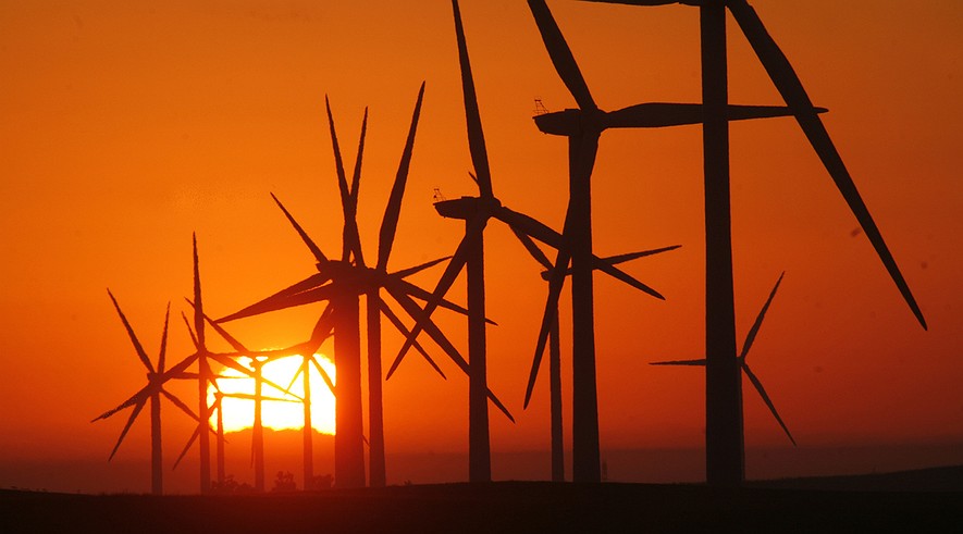 A sunrise view is seen at EDF Renewable's field of gigantic wind turbines, which stand nearly 300 feet high near Rio Vista, Calif., Sept. 24, 2012.