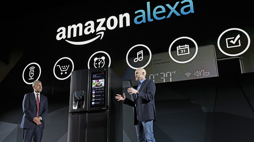 LG Electronics Vice President David VanderWaal and Amazon Echo Vice President Mike George present the LG Smart InstaView Door-in-Door Refrigerator to CES 2017 attendees at the LG Electronics press conference on January 4, 2017, in Las Vegas, Nevada.