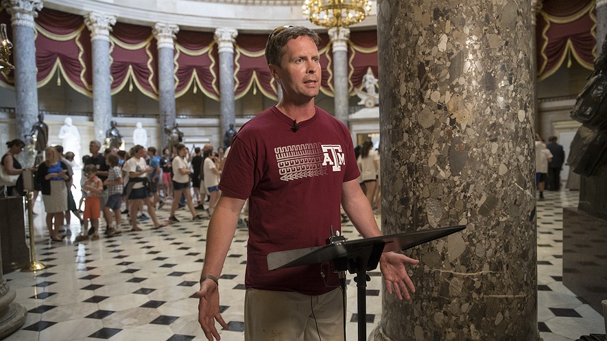 Representative Rodney Davis, a Republican from Illinois, still wearing his baseball uniform, describes for reporters on Capitol Hill in Washington,D.C., the scene during the June 14, 2017, shooting at a congressional baseball game in Alexandria, Virginia, where House Majority Whip Steve Scalise of Louisiana and others were shot. Photo by: AP Photo/J. Scott Applewhite
