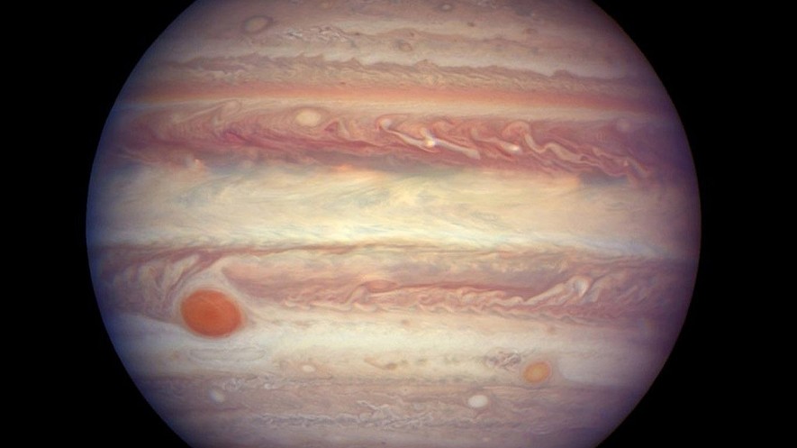 When the solar system was about 1 million years old, Jupiter's gravity was strong enough to prevent rocks from crossing beyond its orbit. Here the planet is seen through a Hubble telescope image. Photo from NASA.gov.